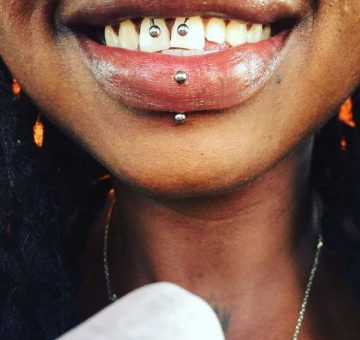 Lips and Smiley Piercing