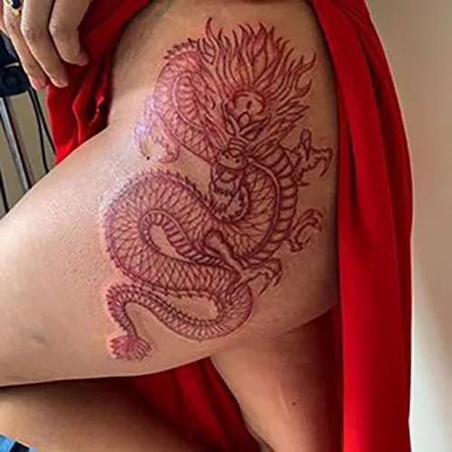 red-dragon-thigh-tattoo