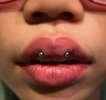 Horizontal Lip Piercing