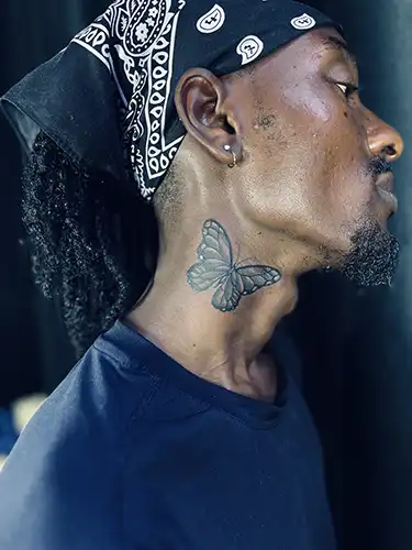 butterfly-neck-tattoo