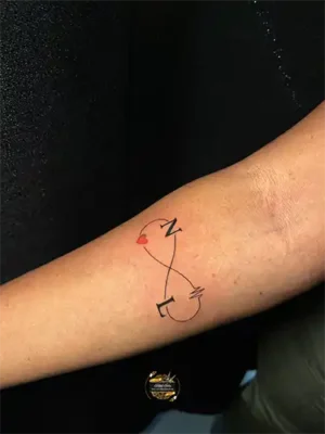 minimalistic-fine-line-infinity-forearm-tattoo
